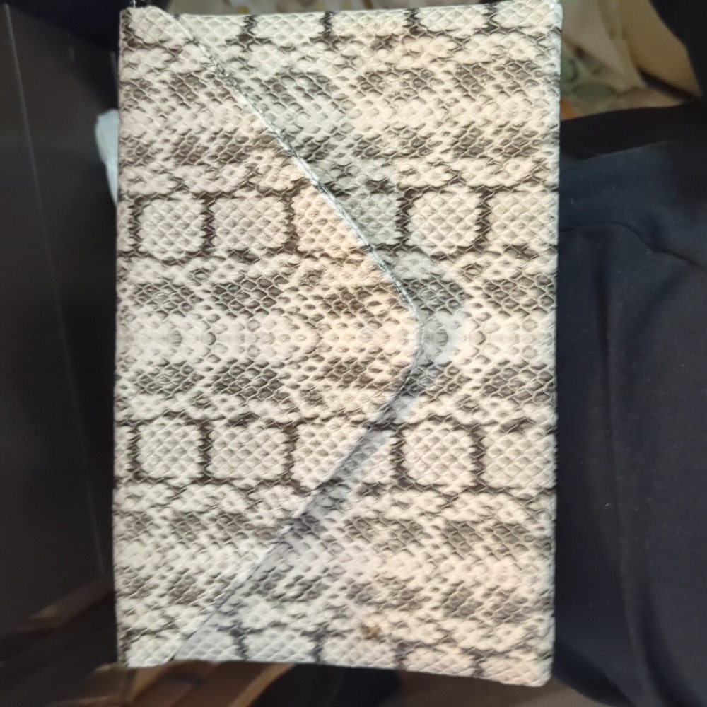 A New Day clutch